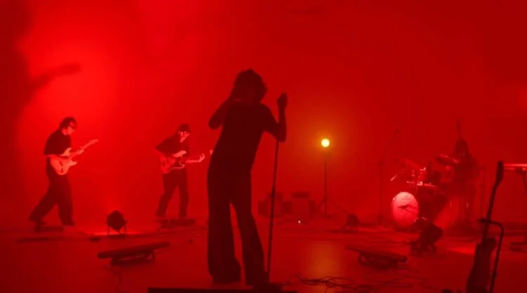 Andoni and band performing She Don't