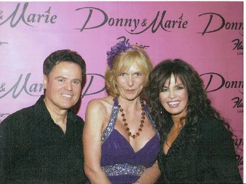 Jennifer Ball wearing Kenneth Fron with Donny & Marie