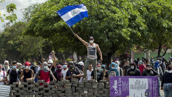 THE BAD NEWS: For the past three months, a police crackdown on civilians protesting Nicaragua's government have led to hundreds of deaths, charges of human rights violations, and an economy at a total standstill. (Photo Credit: BBC News)