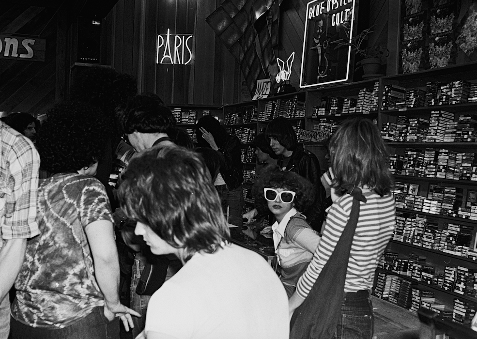 "When Linda got in the van for the first time during that west coast tour, I told her, "You sit in the back row", and she turned to me and said, "Not for long." I thought " What is this, this girl answers back to me?" Joey told her to not say anything but she did anyways. I thought it was kind of funny." -Johnny Ramone, from his book Commando. Linda at the record signing at Licorice Pizza, 1977 by Danny Fields
