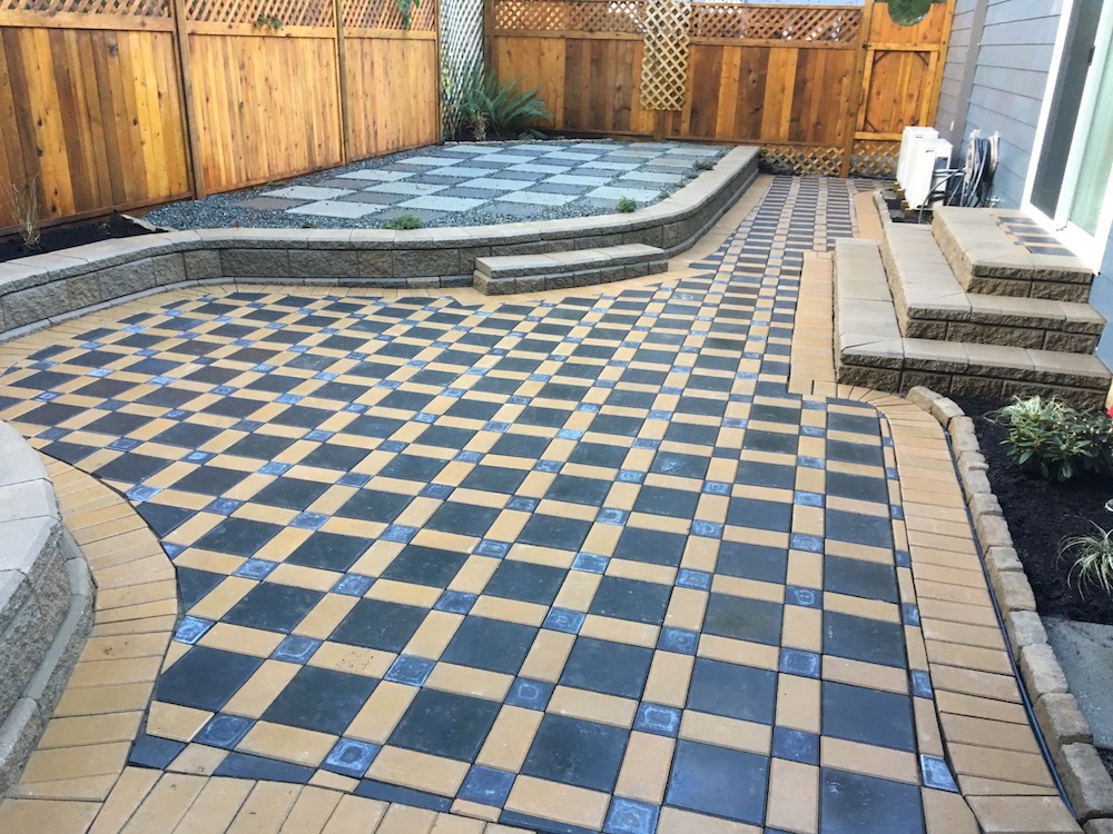 larger paver patio and curved allan block wall - jinglepot landscaping - nanaimo