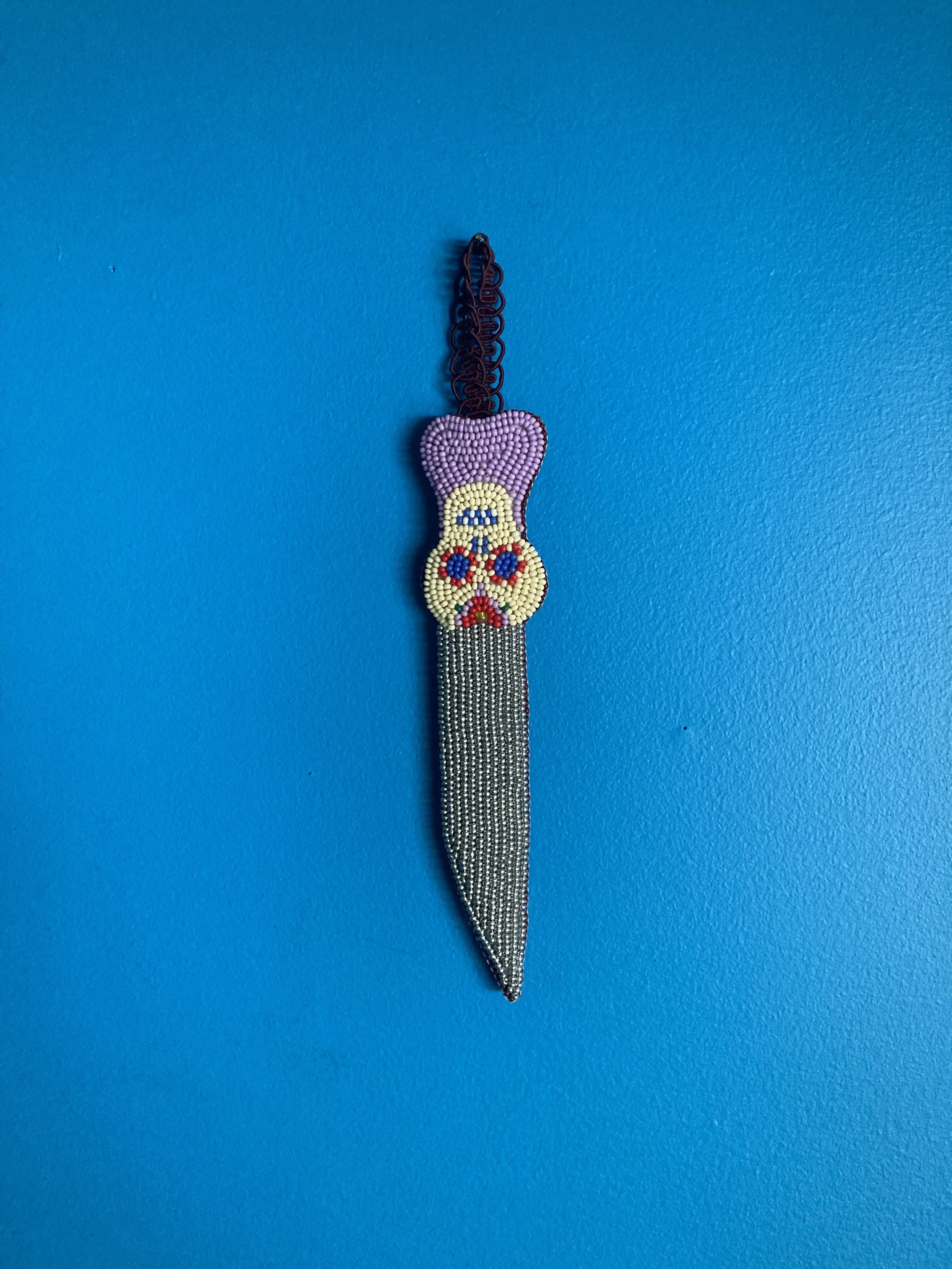 Yaga'sKnifeBlueWall1.jpeg