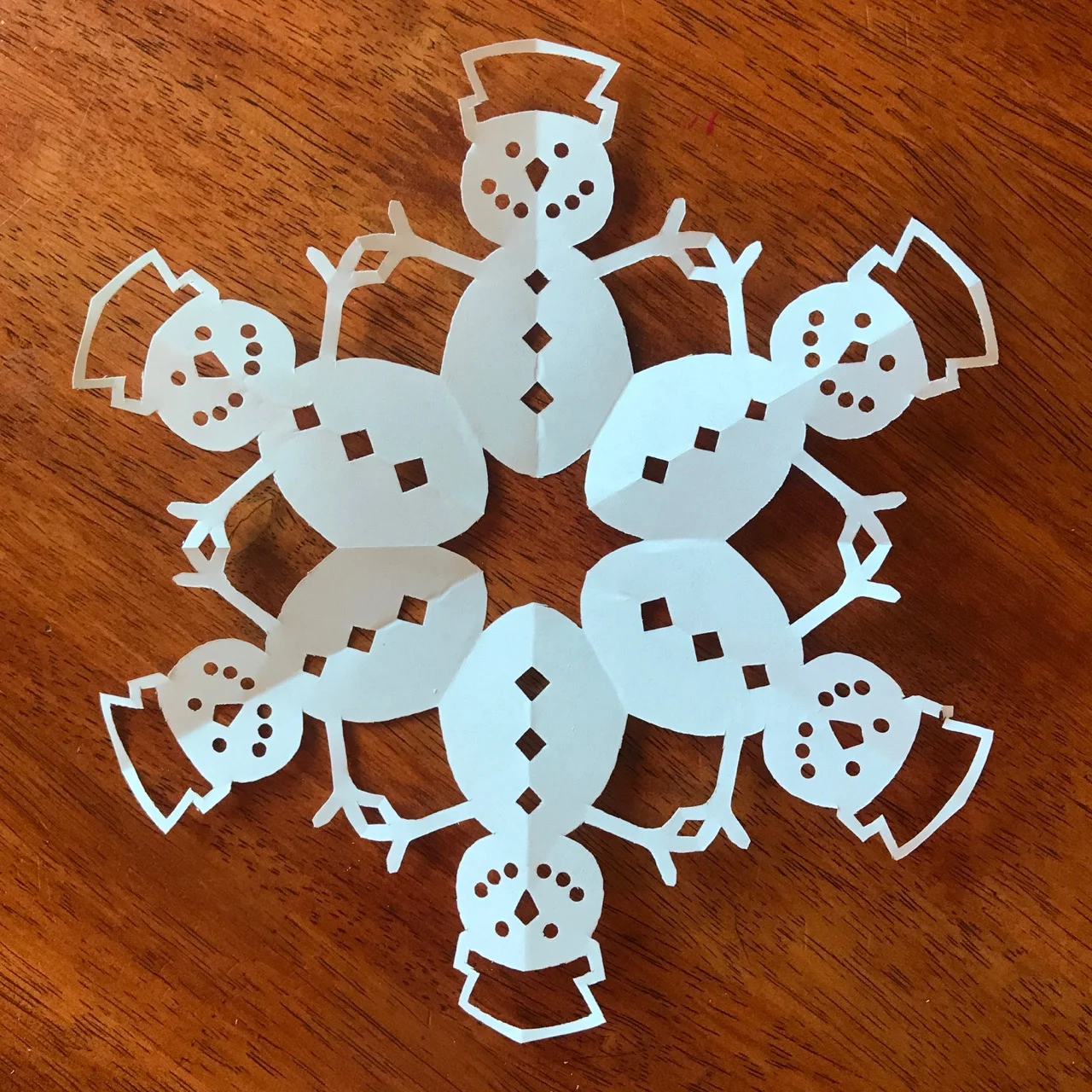 How to make a snowman paper snowflake