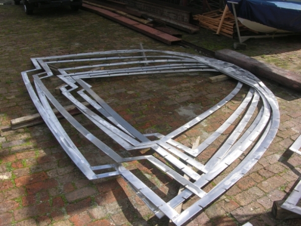 These frames will soon be set in place to start defining the shape of the hull and deck.