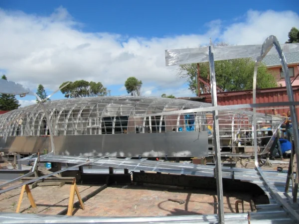 A skeleton with no skin. The mild Cape Town weather allows for outdoor boat building.