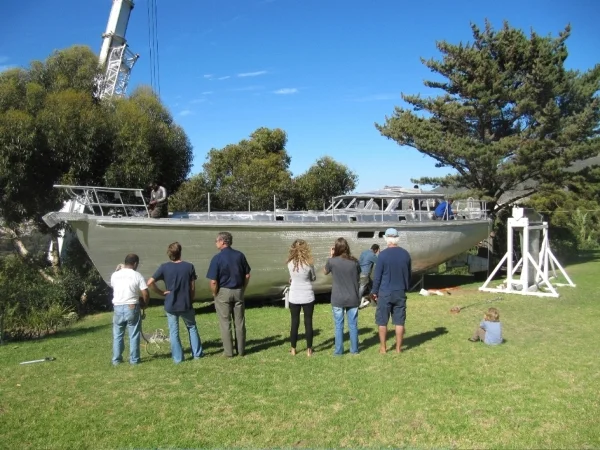 Family and friends gather to watch the delivery of EVA to her owners' back yard.