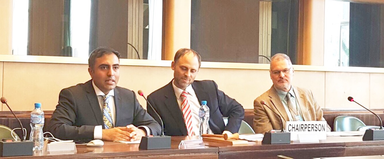 Inder Comar (left) provides a statement at the United Nations regarding the effect and purpose of the Trump Travel bans. Swiss lawyer Pierre Bayonet (center) and international human rights lawyer Dr. Curtis Doebbler (right).