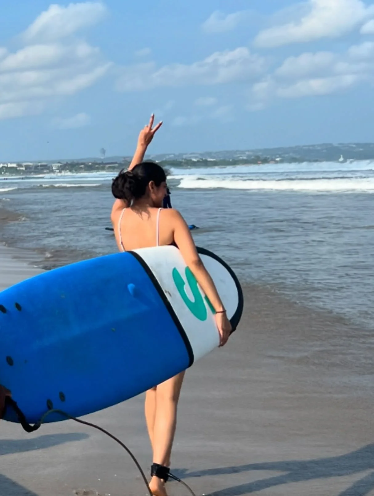 Saltwater rebel with a surfboard. 🏄🏻&zwj;♀️⚡️#balidiaries #surfing #whenincity | repost: @girlwithcurlsss9