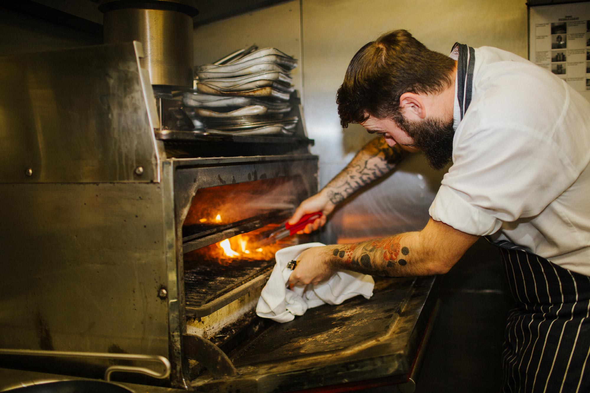 Chef at the Josper oven at The Globe pub and restaurant in Warwick.jpg