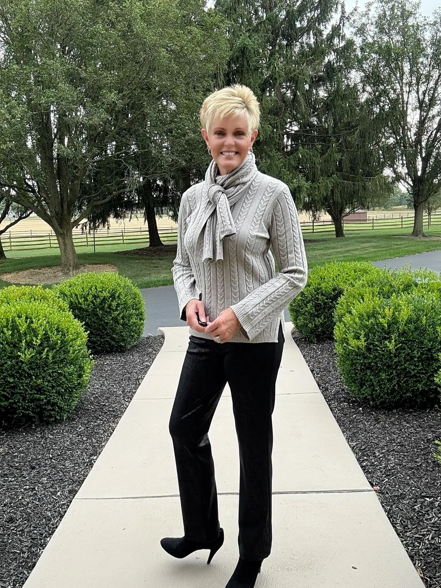 Cable knit sweater with matching scarf from Skovhuus is timeless in style.  The soft, cozy knit makes it easy to wear.
.
.
#shopsimplyjhershey #skovhuus