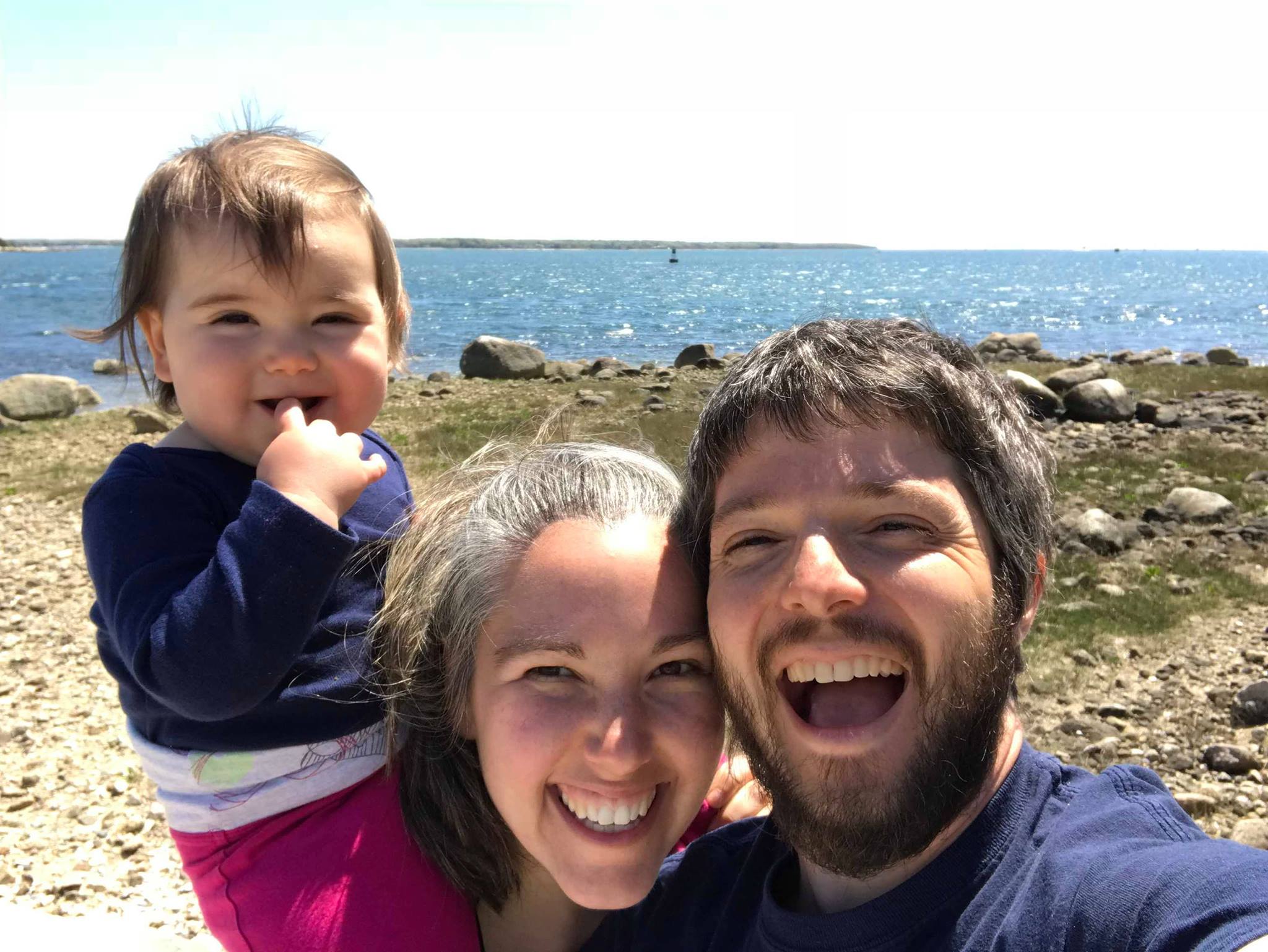 Nathan, Sarah and Ana taking a selfie at the beach.