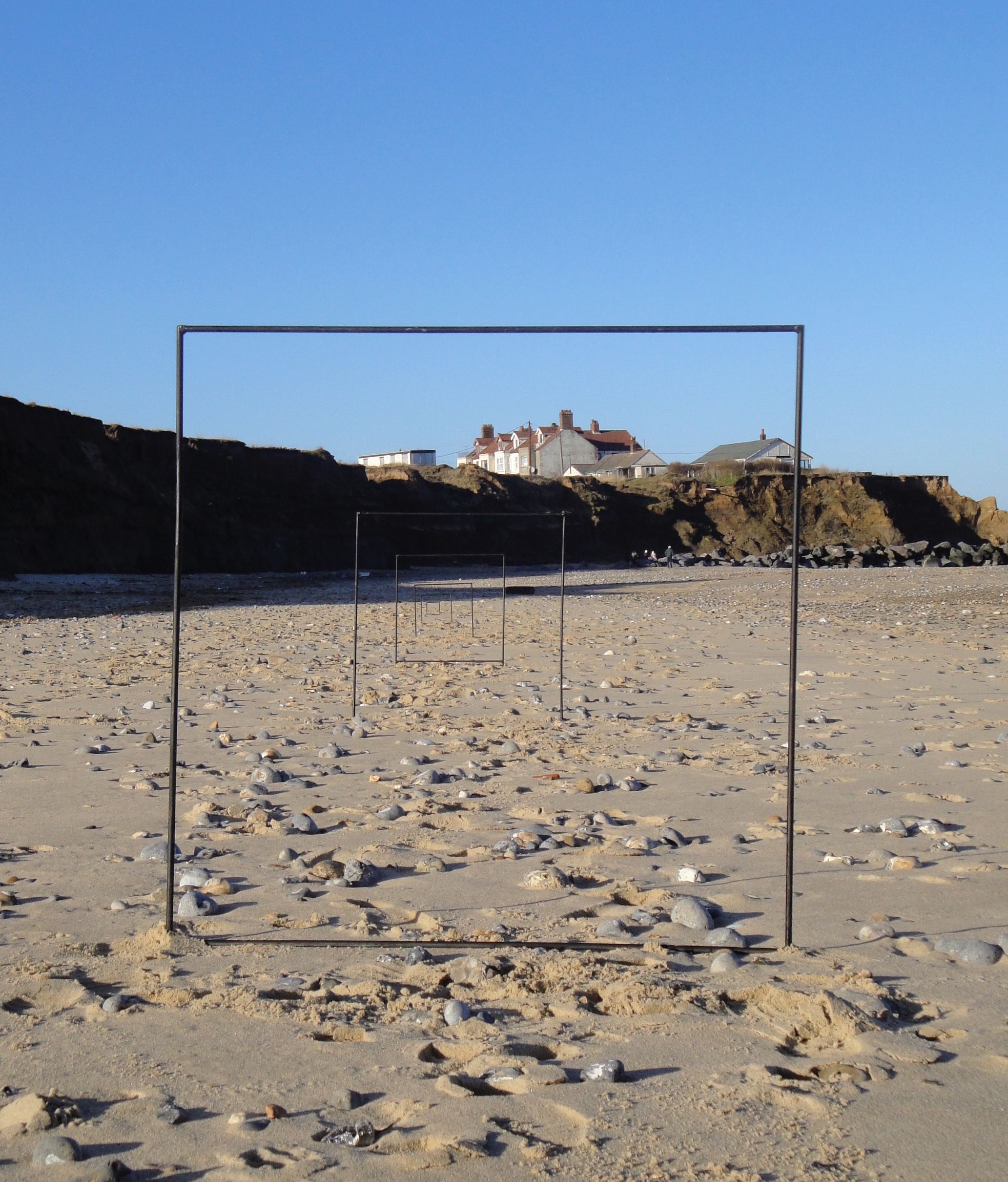 This image comes from an installation Kaitlin Ferguson made on Happisburgh beach in Norfolk, annually measuring its dramatic changes through climate change from 2014 onwards
