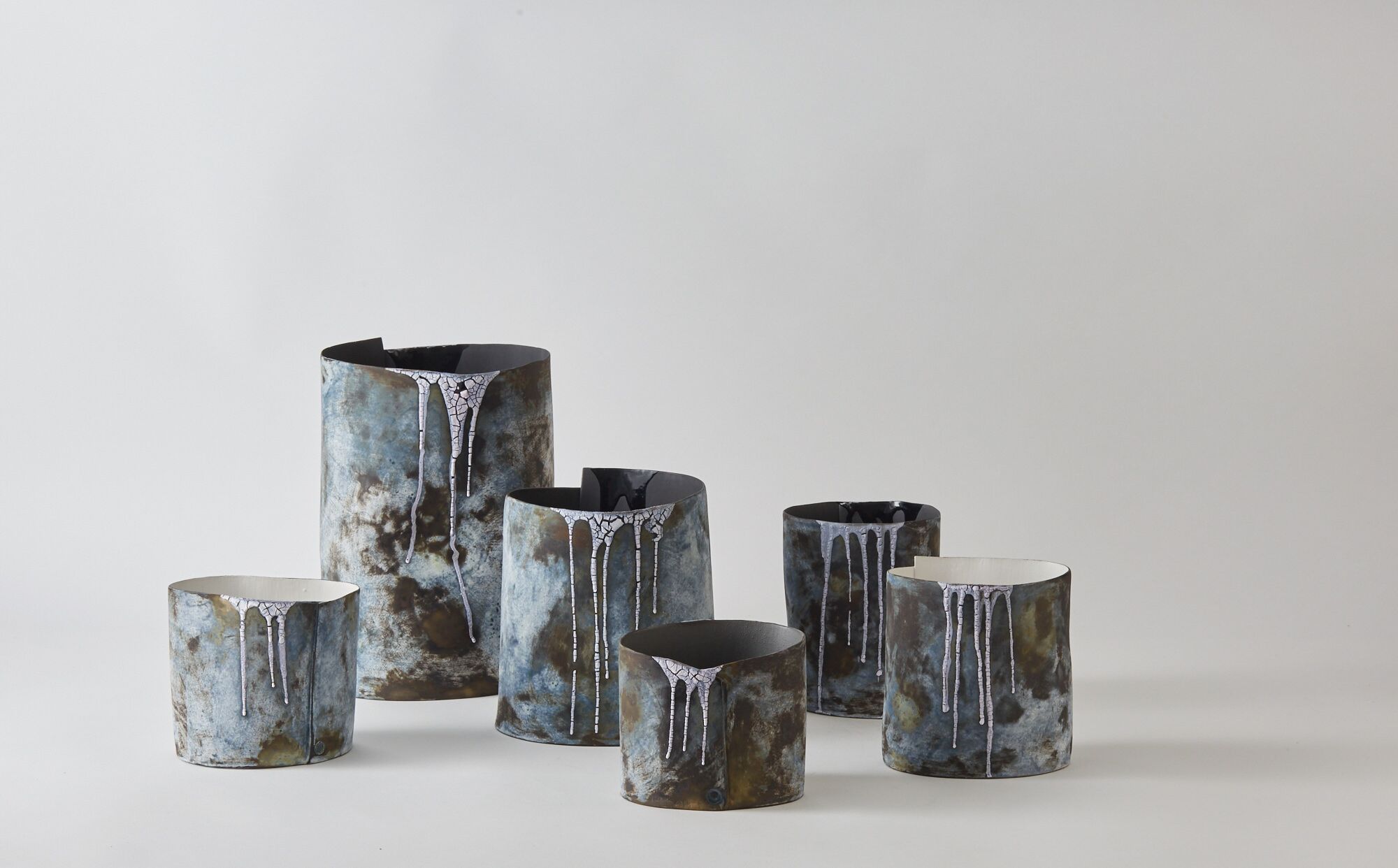 This is part of a collection of stoneware vessels made following the artist's visit to Iceland. It is a perfect medium to reflect her responses to that country's fragile, watery, changing landscapes. 
