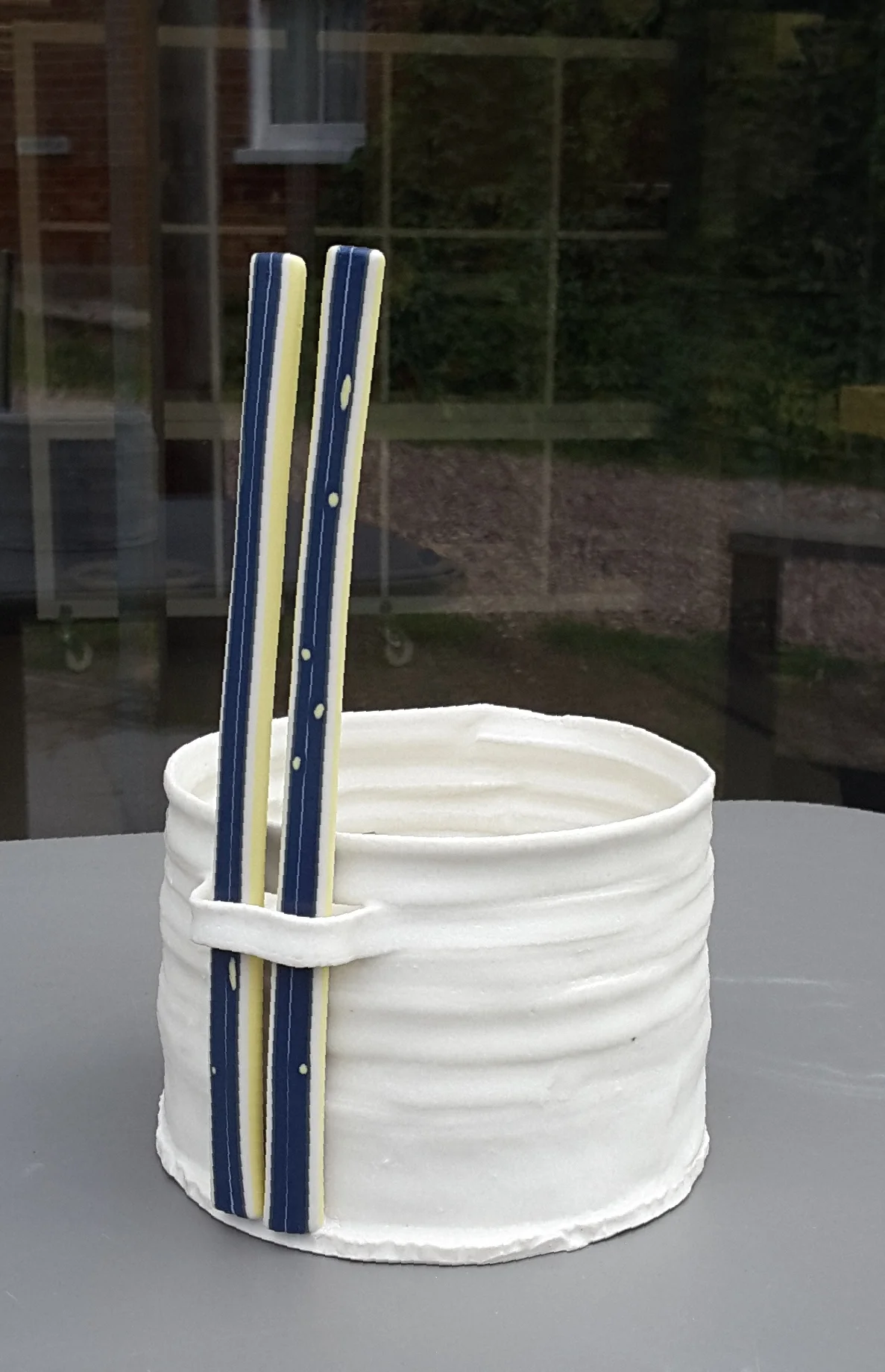 This vessel group reflects the tenacious and private attitudes of fenlanders who sometimes live in remote windswept homes behind barriers of Leylandii trees which have been grown as an embattled fort. Usually pollarded to extremity with the tree trunk revealed, chopped at its peak and leaves removed from the outside whilst remaining verdant and private from prying eyes within its inner safe world.