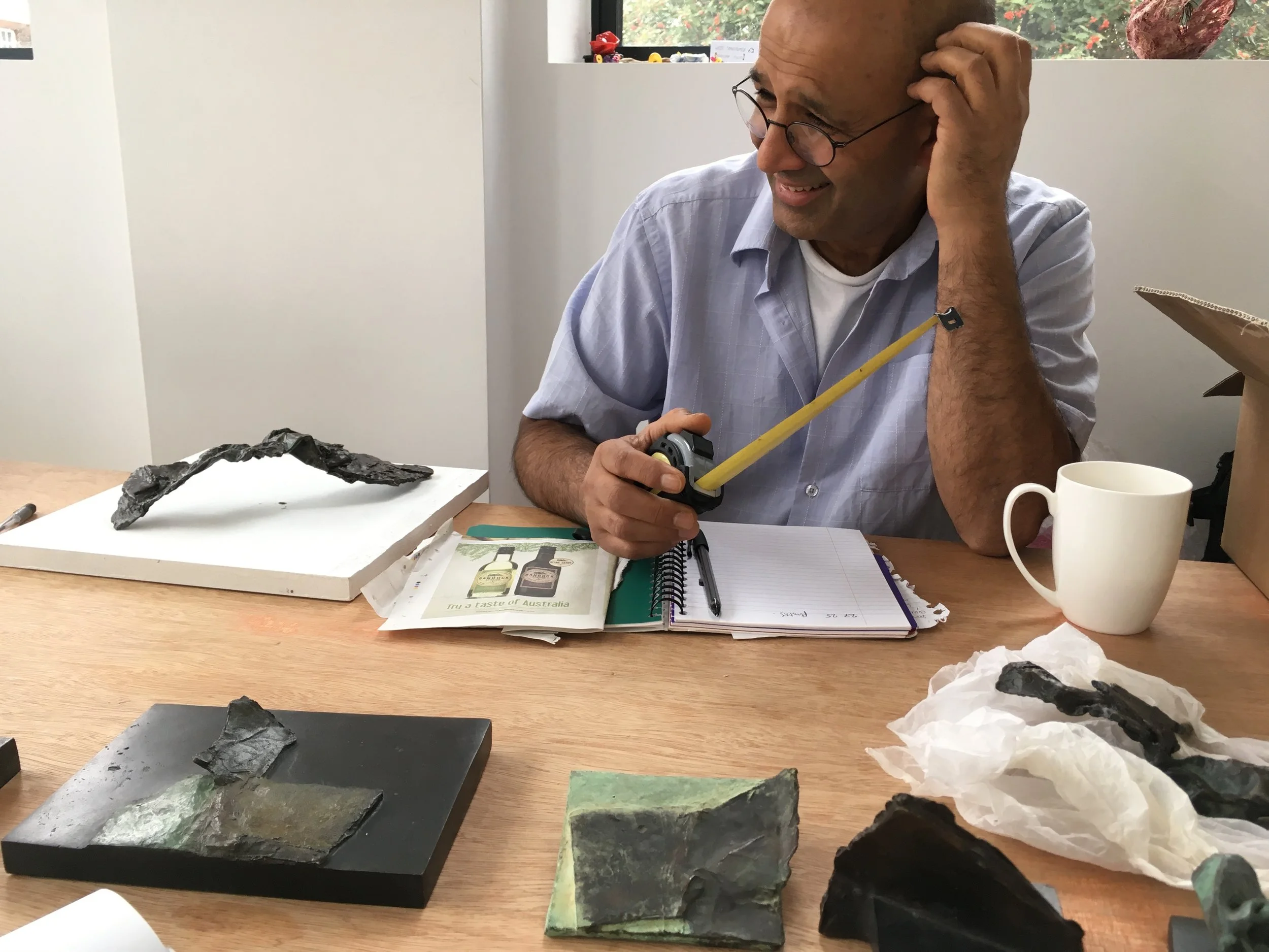 Kabir Hussain planning our exhibit at GroundWork
