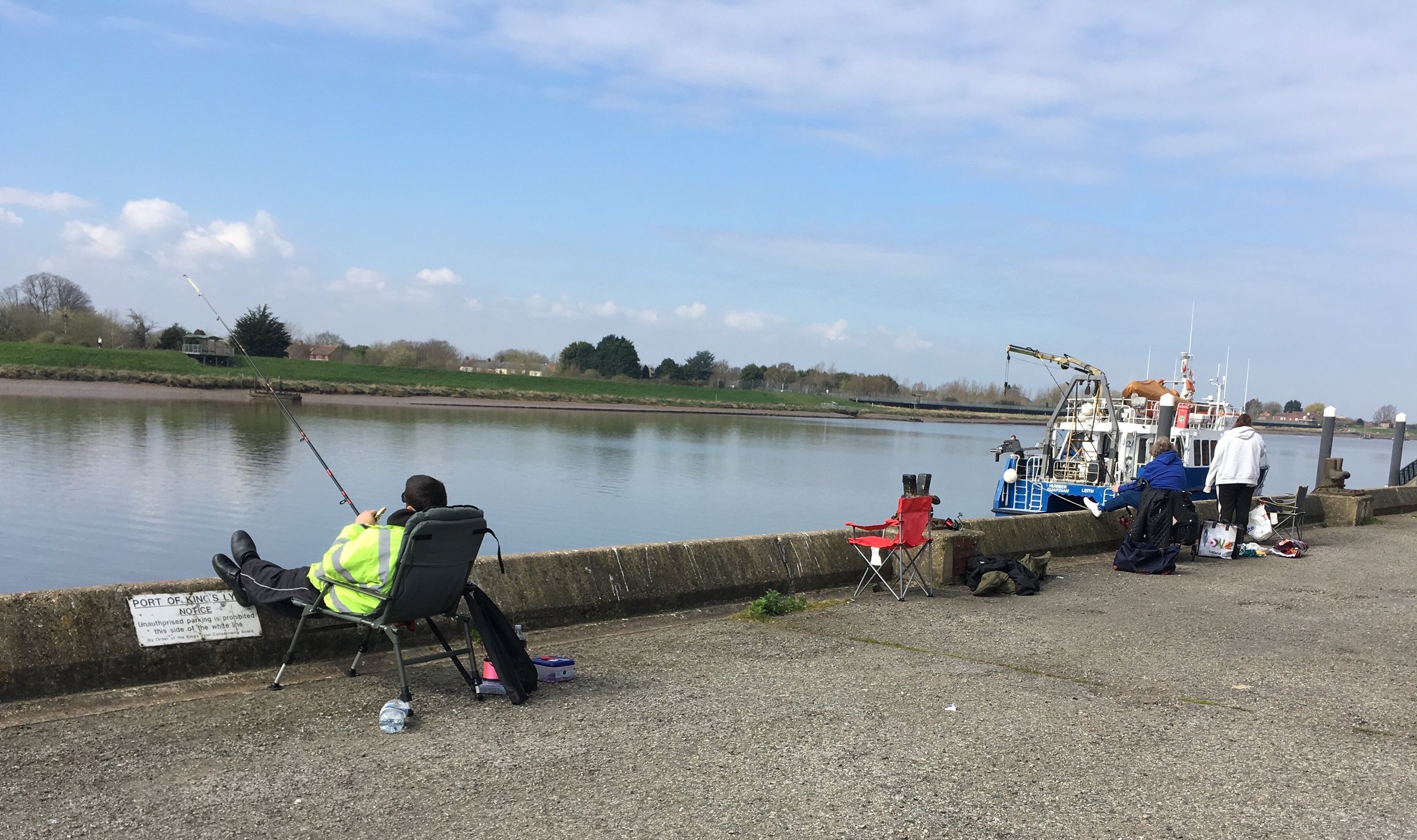 Watching the fishermen and women on the quayside