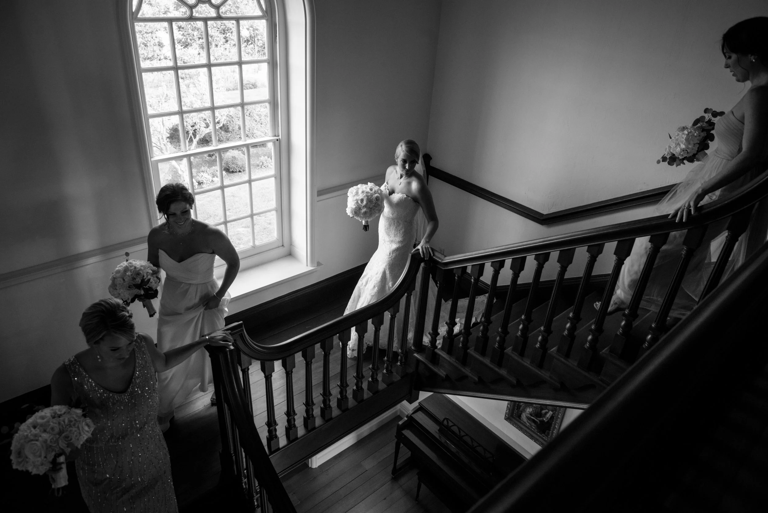 Bride walking down the staircase