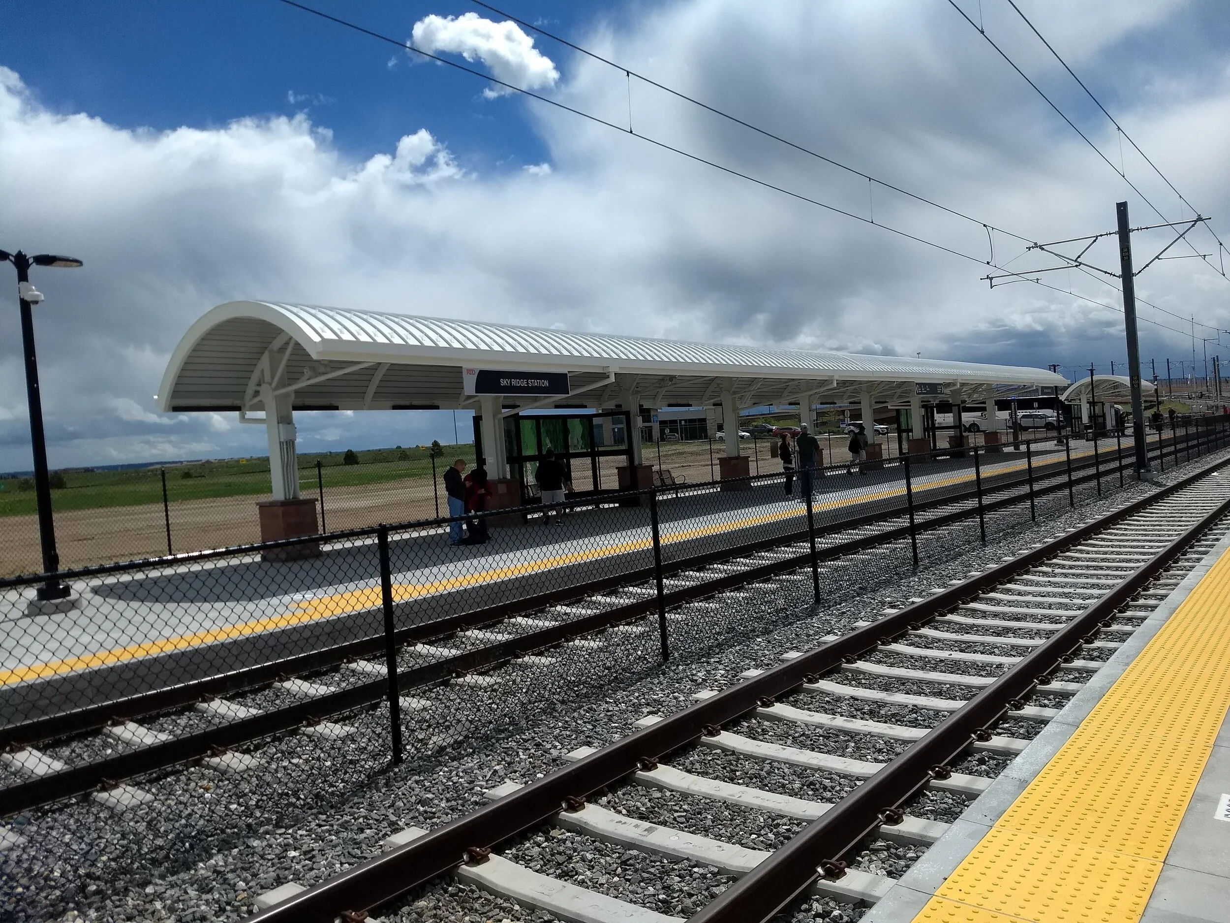 RTD - Southeast Rail Extension
The Southeast Rail Extension is a continuation of an existing 19.1 mile light rail line, extending south from the Lincoln Station to RidgeGate Parkway in Lone Tree, CO. This RTD FasTracks, Design/Build project inclu