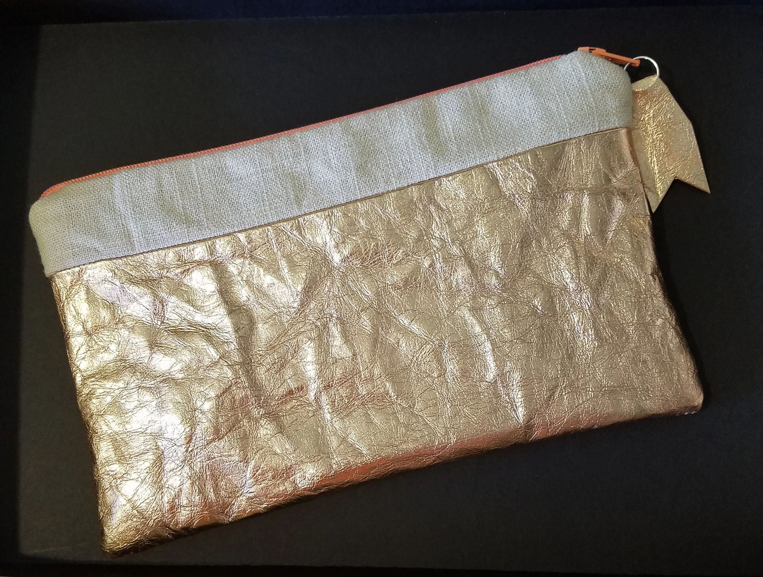 Rose Gold washable paper and linen zipper pouch.