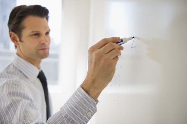 Man%20with%20whiteboard_jpg.jpg