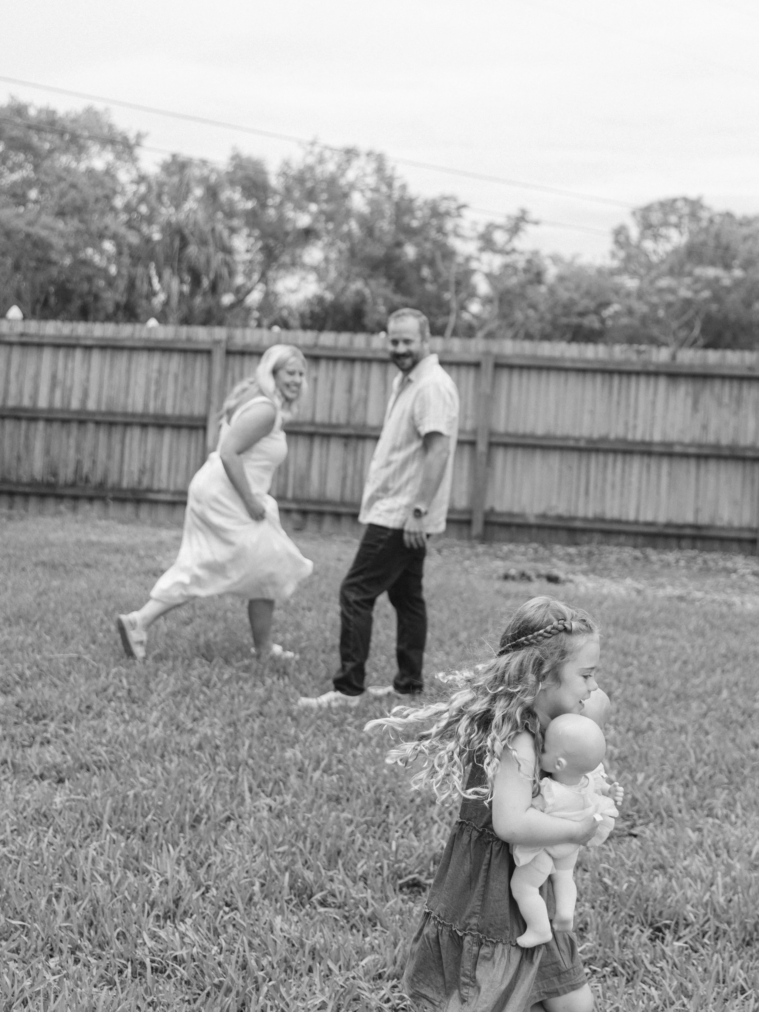 Rule #1 of a family session: Let the kiddos run the show. Rule #2: Expect the unexpected and lean into it. We played with castles, read books, had a donut break, played games and took very convincing pretend naps on the couch and living room floor wh