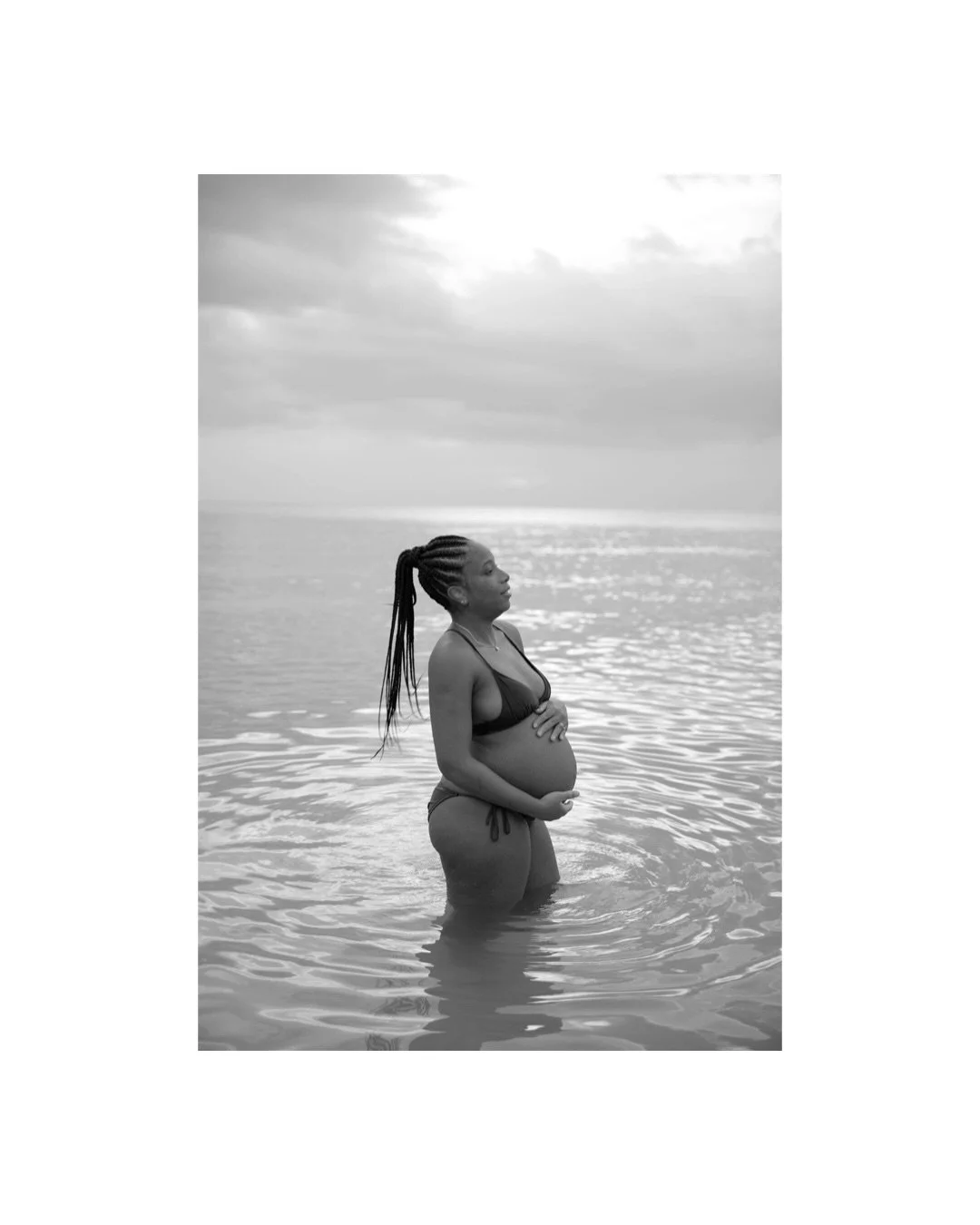 The sweetest family session. Still thinking about how this sweet girl was so excited to hug her mama&rsquo;s belly and get in the water with her. ❤️