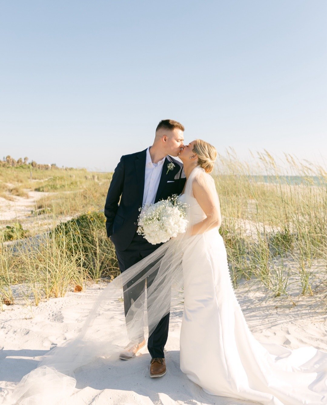 The kind of wedding day where the shoes come off early and nothing feels rushed.

I always want your gallery to have a balance of both sides, the clean, classic portraits that your family will frame and the unscripted moments where you completely for
