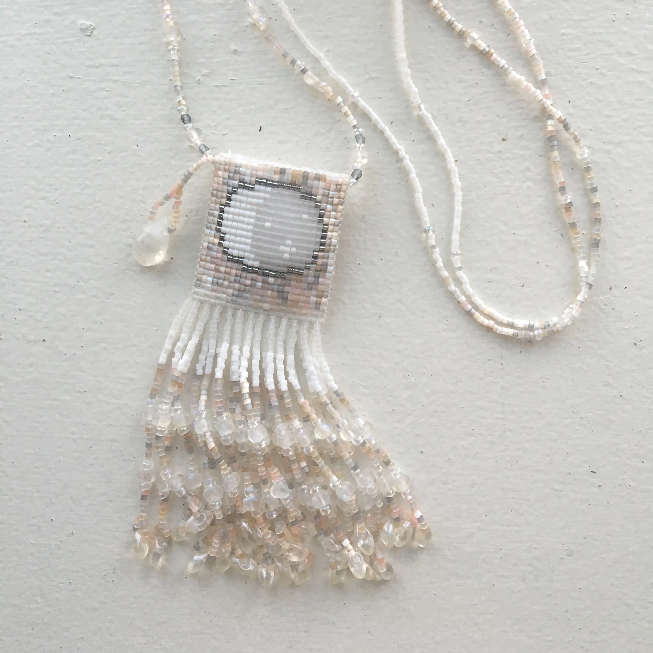 White sky moon mini amulet bag with moonstone