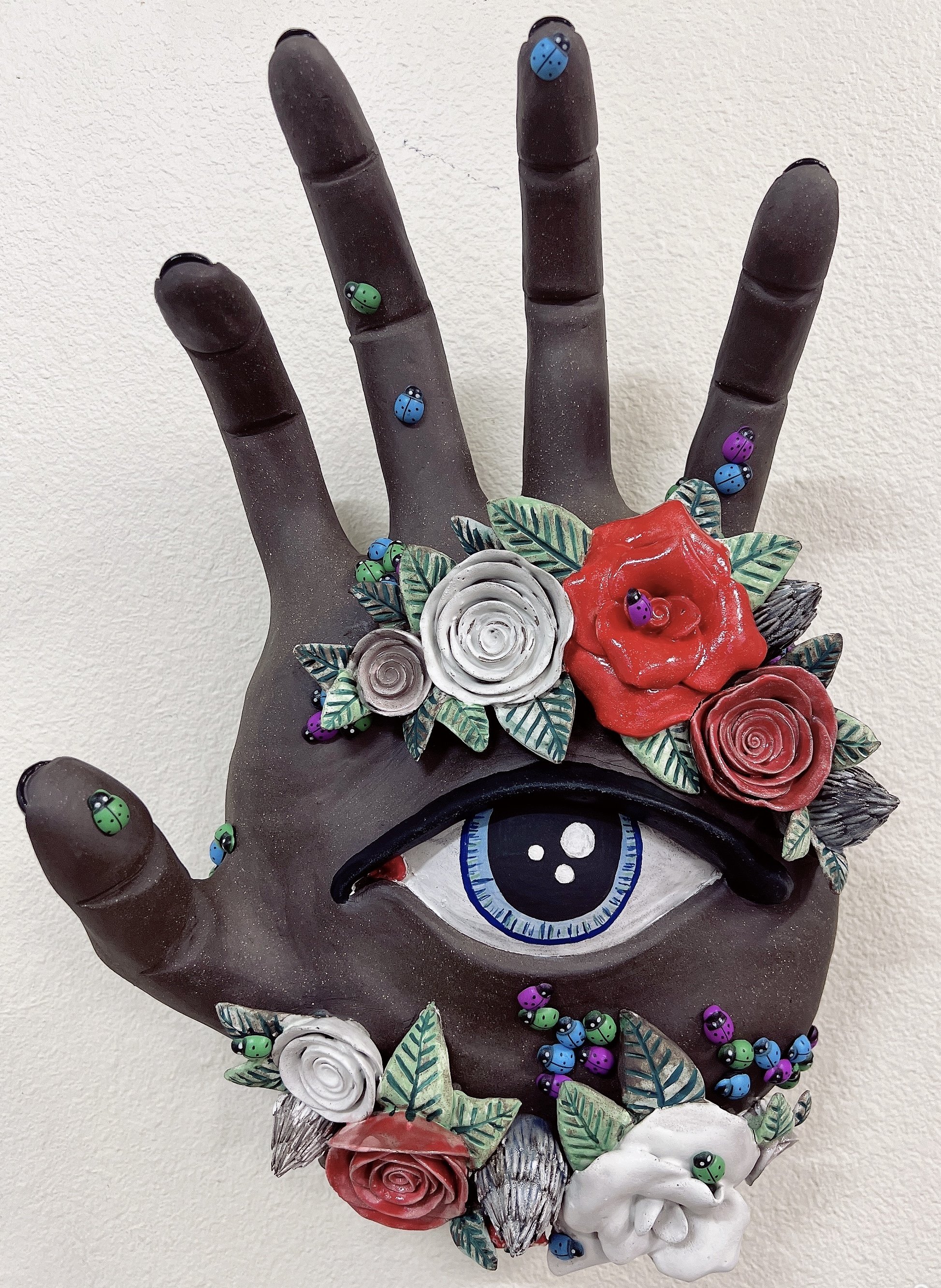 Eye See You%22  H7X W19X L15  black stoneware, underglaze, luster, mixed media, 2024.jpg