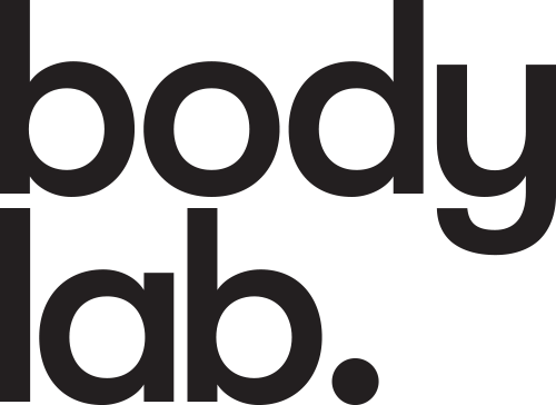 Close-up of the text 'body lab.' in large black font on a white background.