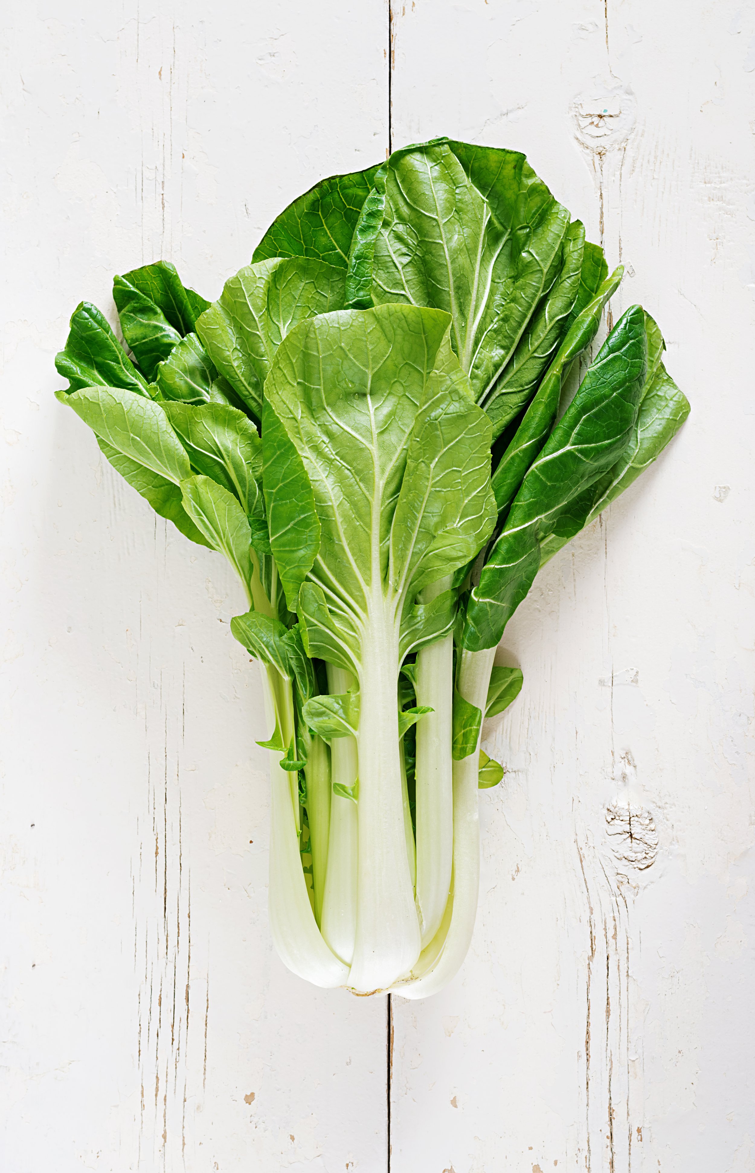 chinese-cabbage-white-wooden-table.jpg