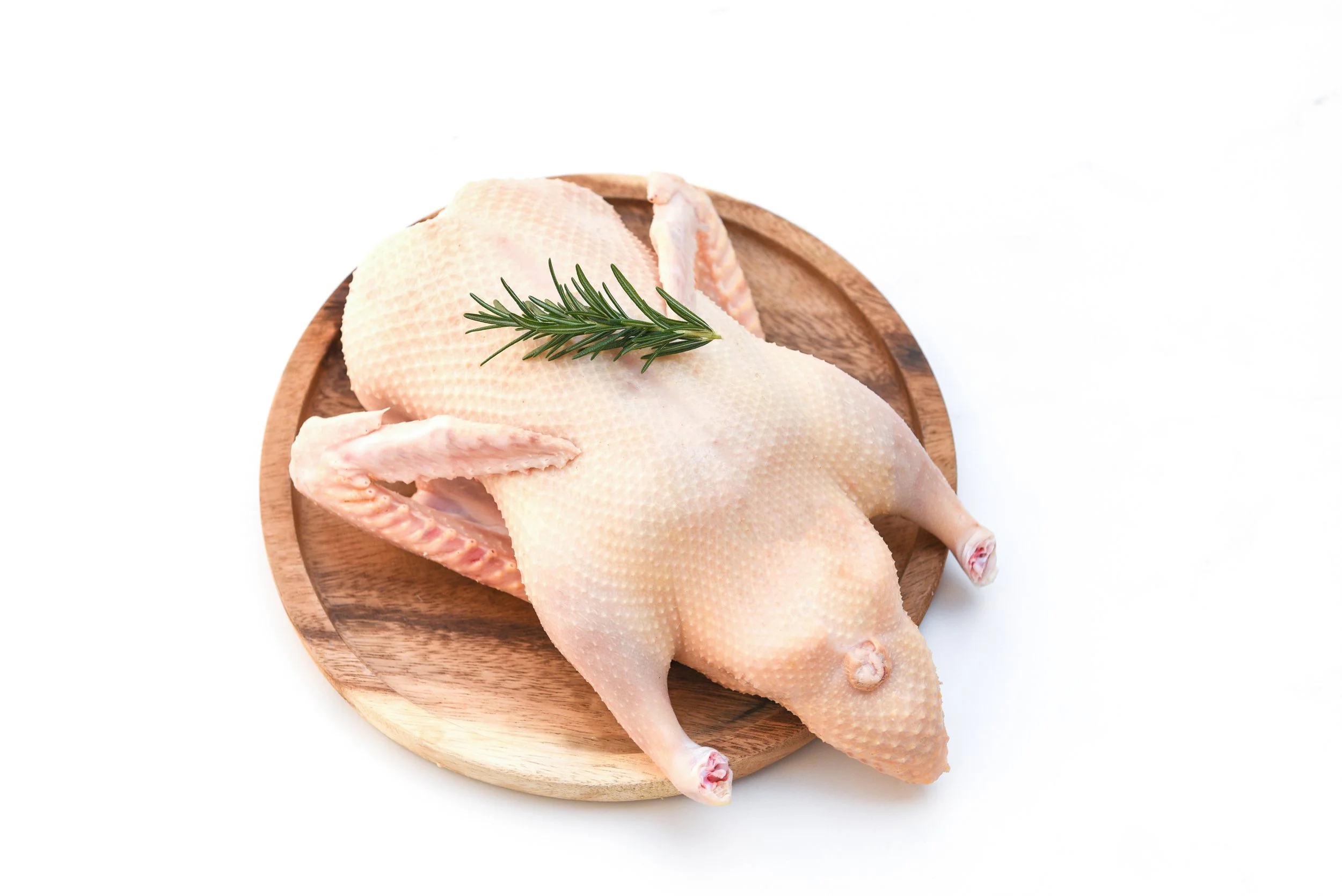 raw-duck-isolated-white-background-fresh-duck-meat-wooden-tray-food-whole-duck.jpg