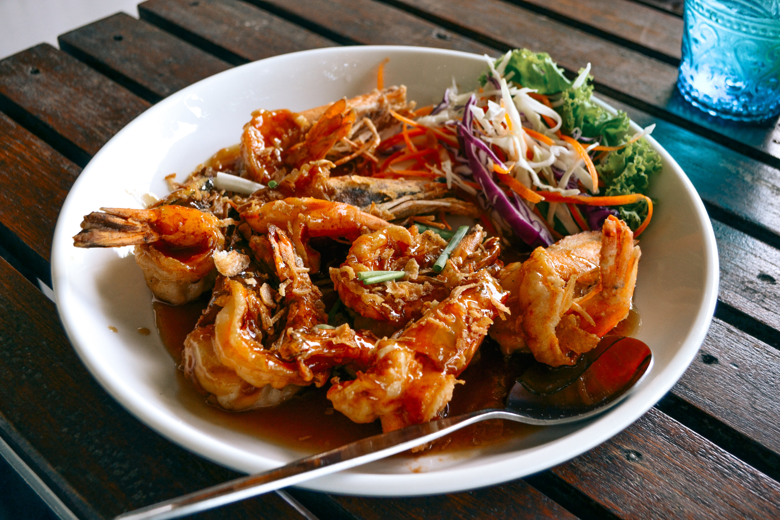 After a very naked, very deep tissue Thai massage, we motorbiked to the coast to grab a lunch of grilled shrimp and fish. Pai