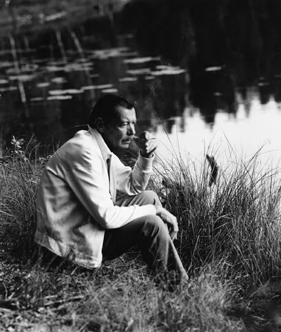 Aimo Okkolin by the pond. Photographer Erkki Vaalle