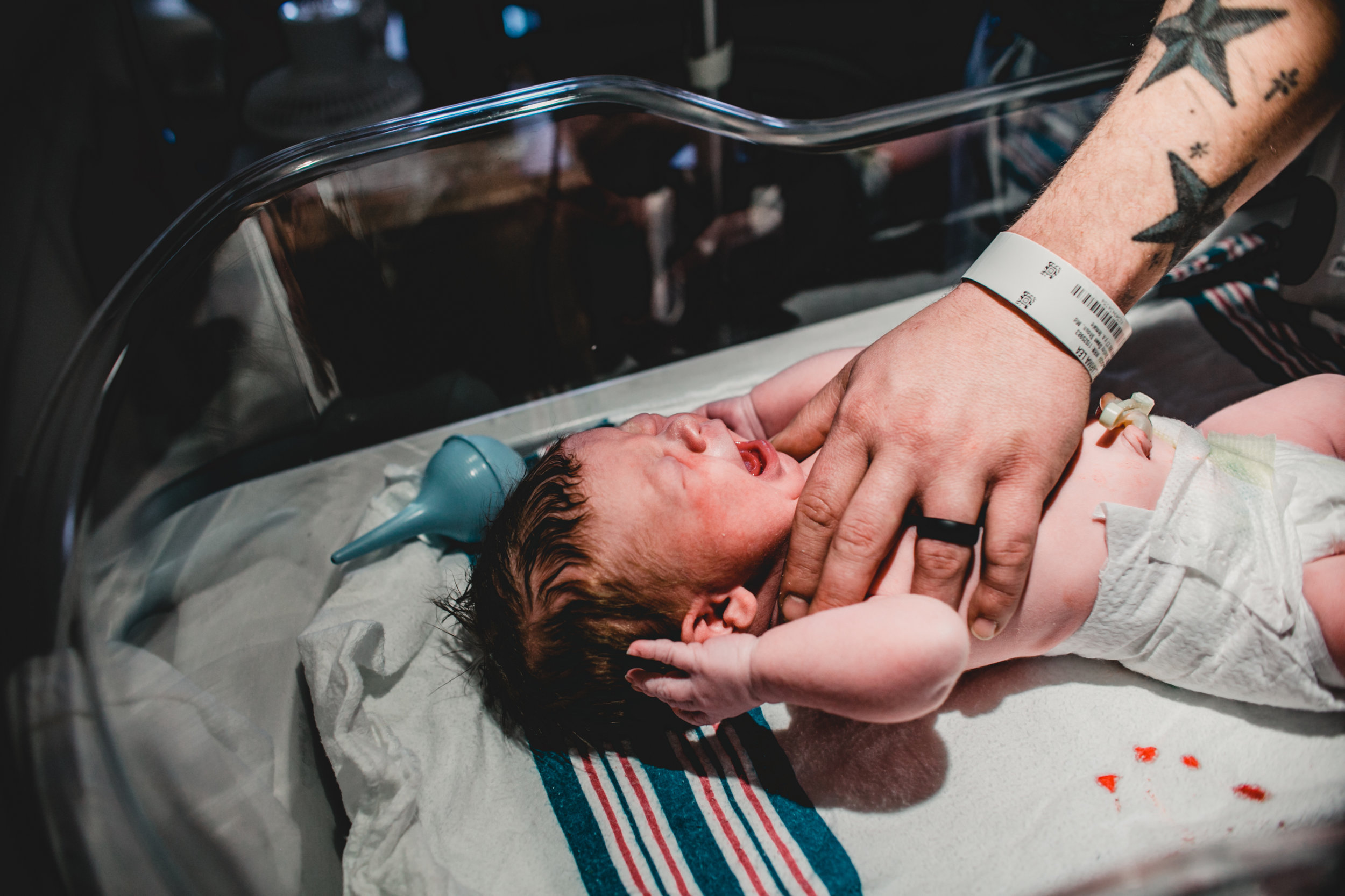 newborn-dad-hands.jpg