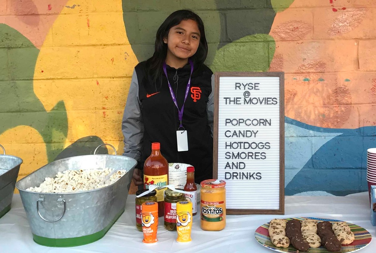 Clarisa supports during RYSE’s outdoor movie night as part of our members and families appreciation week, October 2018.