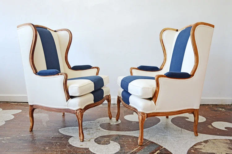 Two smaller scale wingbacks upholstered like these would make great host and hostess chairs at a dining table. Source: Chairloom Upholstery (USA)