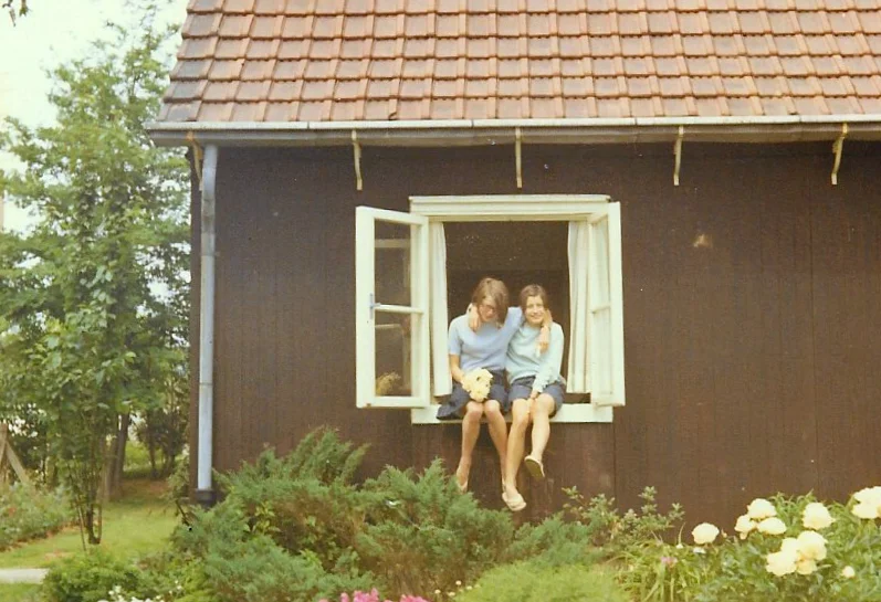 As teenagers, my youngest sister and I. An old photo, so not great quality.