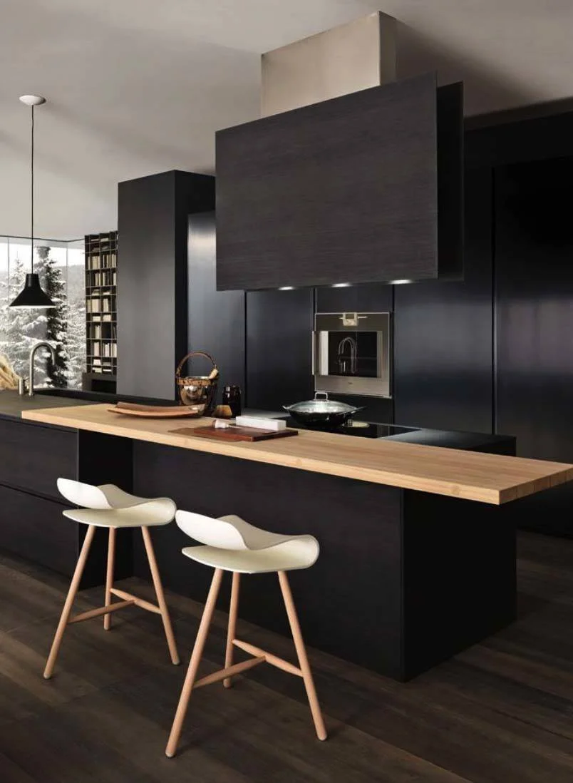A Modulnova Kitchen (Italy). Contemporary and elegant, I particularly like how the natural light wood softens the look of the black finish.