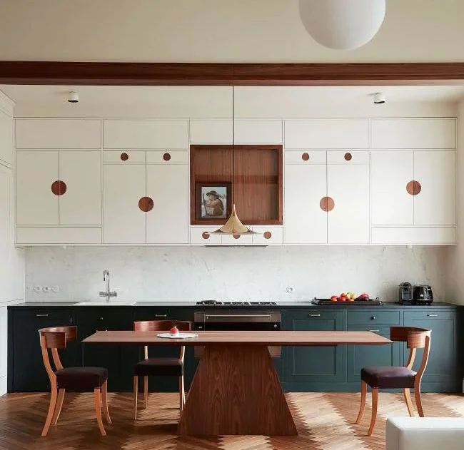 Kitchen with Art Deco details and Klysmos style chairs. Playful, stylish and suitable for family life as well as entertaining. The distinct handle details are sprouting up here and there in today’s kitchens. Source: