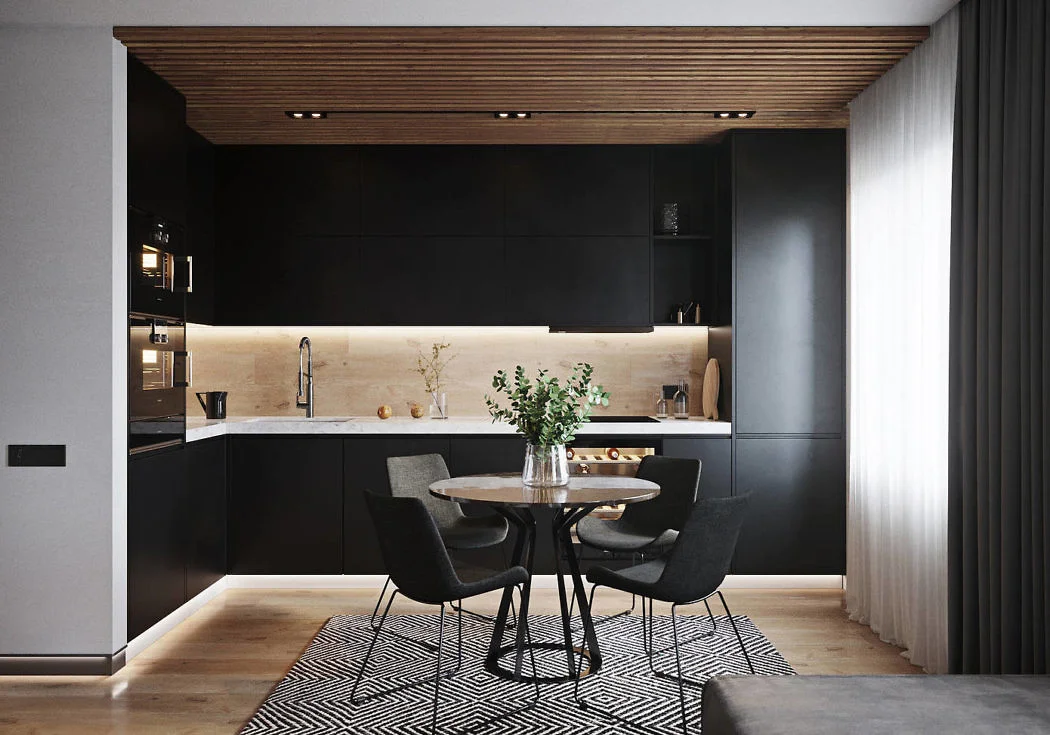 Source: Bellas Artes. How beautiful the black elements are coordinated in this streamlined kitchen. Not overpowering, not somber but just enough to showcase the sleek lines in this design. The dark colours are softened by the wood floor and ceilings and the warm tones in the backsplash. Very European looking!