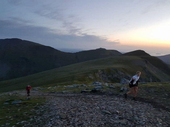 Ascending Y Garn - still smiling! Photo by Michael Jones