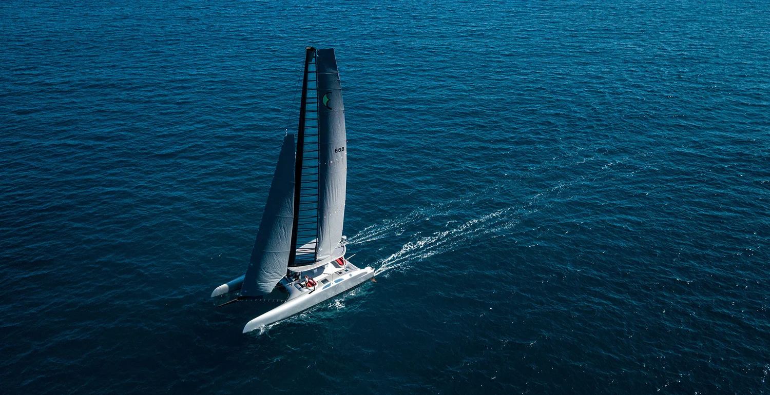 Eagle Class 53 foiling catamaran under sail, aerial view