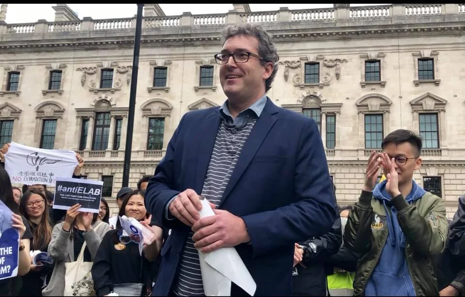 Chairman of Hong Kong Watch, Benedict Rogers, speaking to the group of demonstrators in Parliament Square on 16 June 2019.
