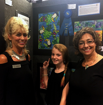 2015 Art-tini 1st place winner Cassidy Hughes for her mixed media artwork titled "American Rainforest Jazzy Jingle".