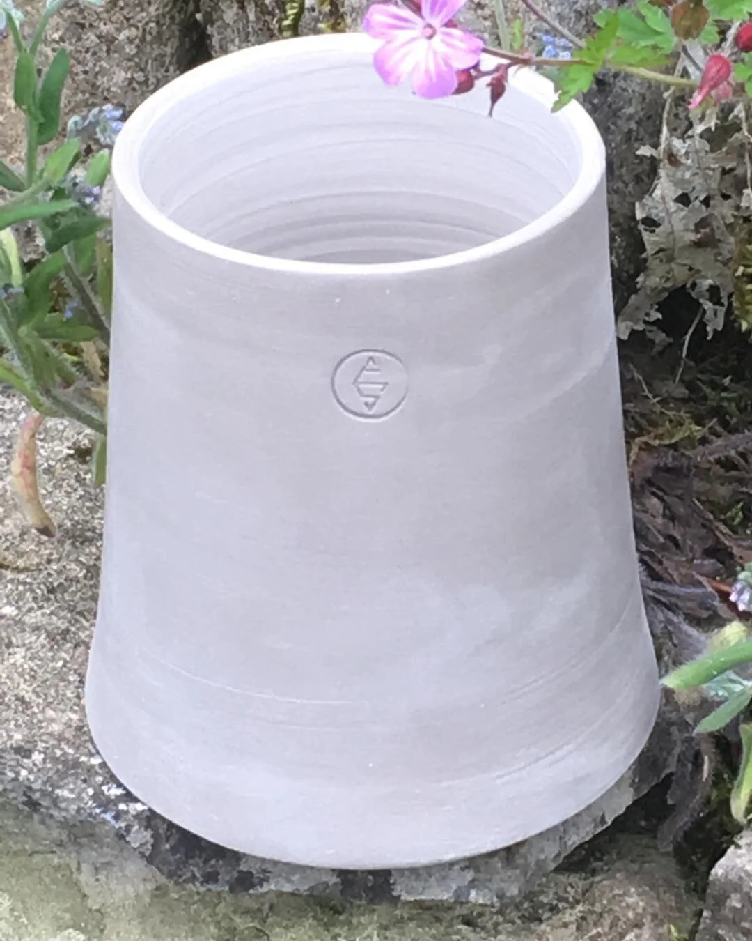 My new potters signature stamp, designed to incorporate The Earth and Fire sign within my initials, thank you Milly Hill, my talented niece  #ceramic #craftpotter #pottersstamp #signature #workshops #daylesford #GreyHeron #cotswoldpotter #stoneware