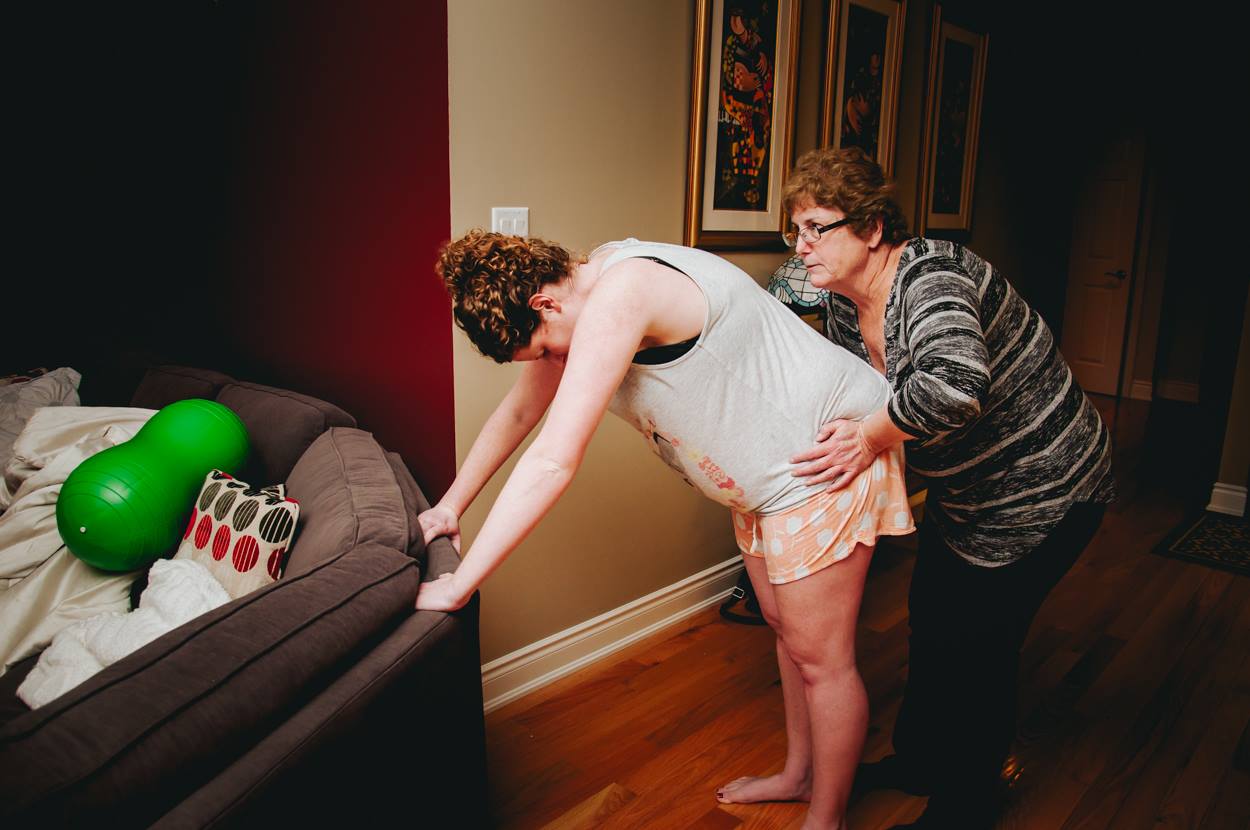 mommacollective.ca working hard, right alongside her baby girl. This grandma was "in the zone" for the entire birth!