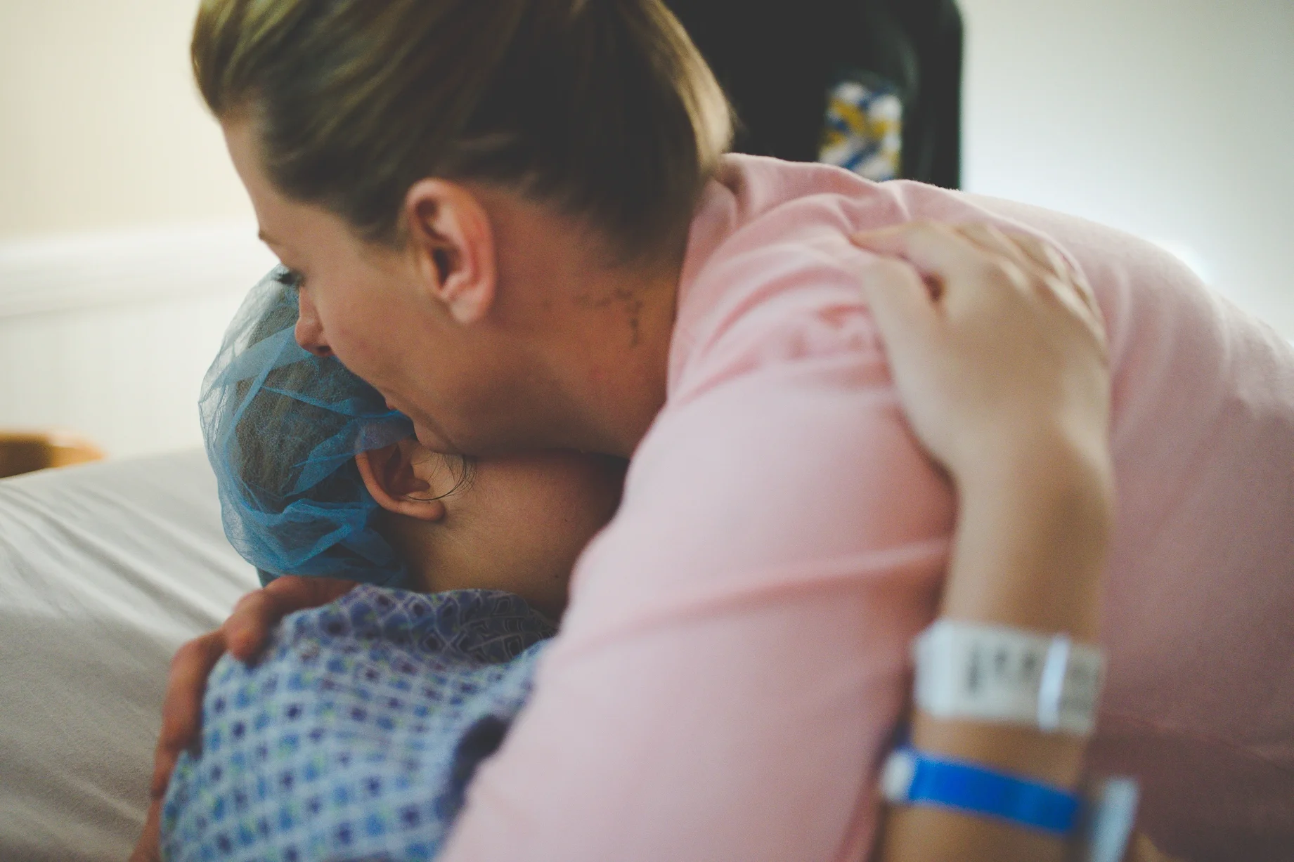 www.tampabirthphotographer.com A moment of comforting before an emergency c-section.