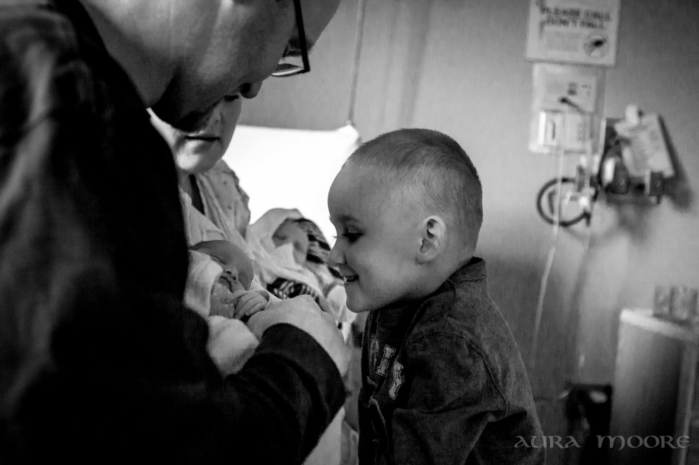 www.auramoore.com Meeting his twin baby sister and brother for the first time.