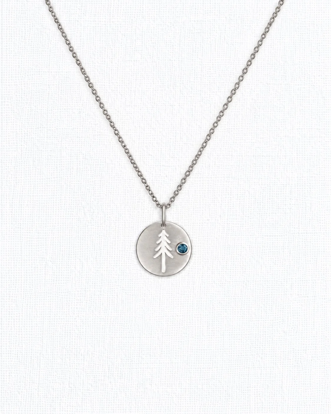 Sapphire Bezel Set Tree Silhouette Medallion Pendant.jpg
